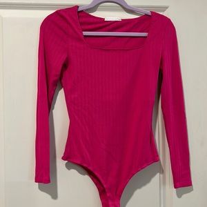 Bodysuit. Square neck with long sleeves and built in bra